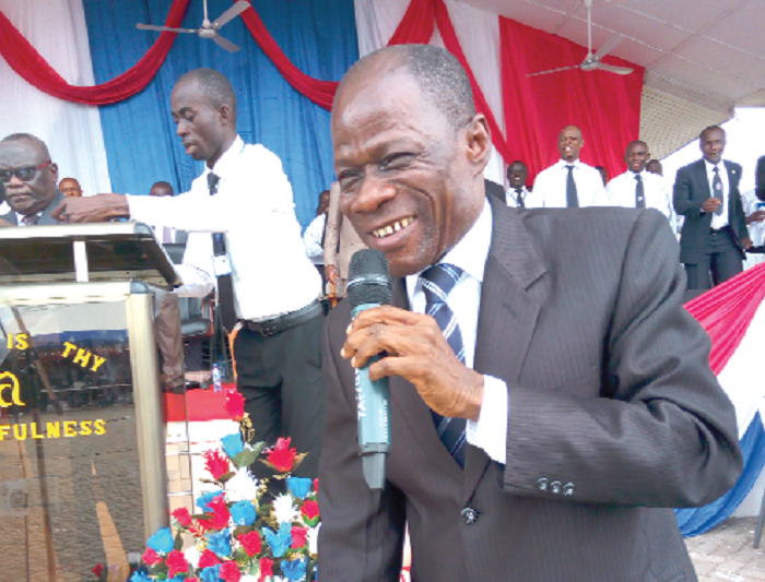 Apostle P. O. Mankralo addressing the congregation